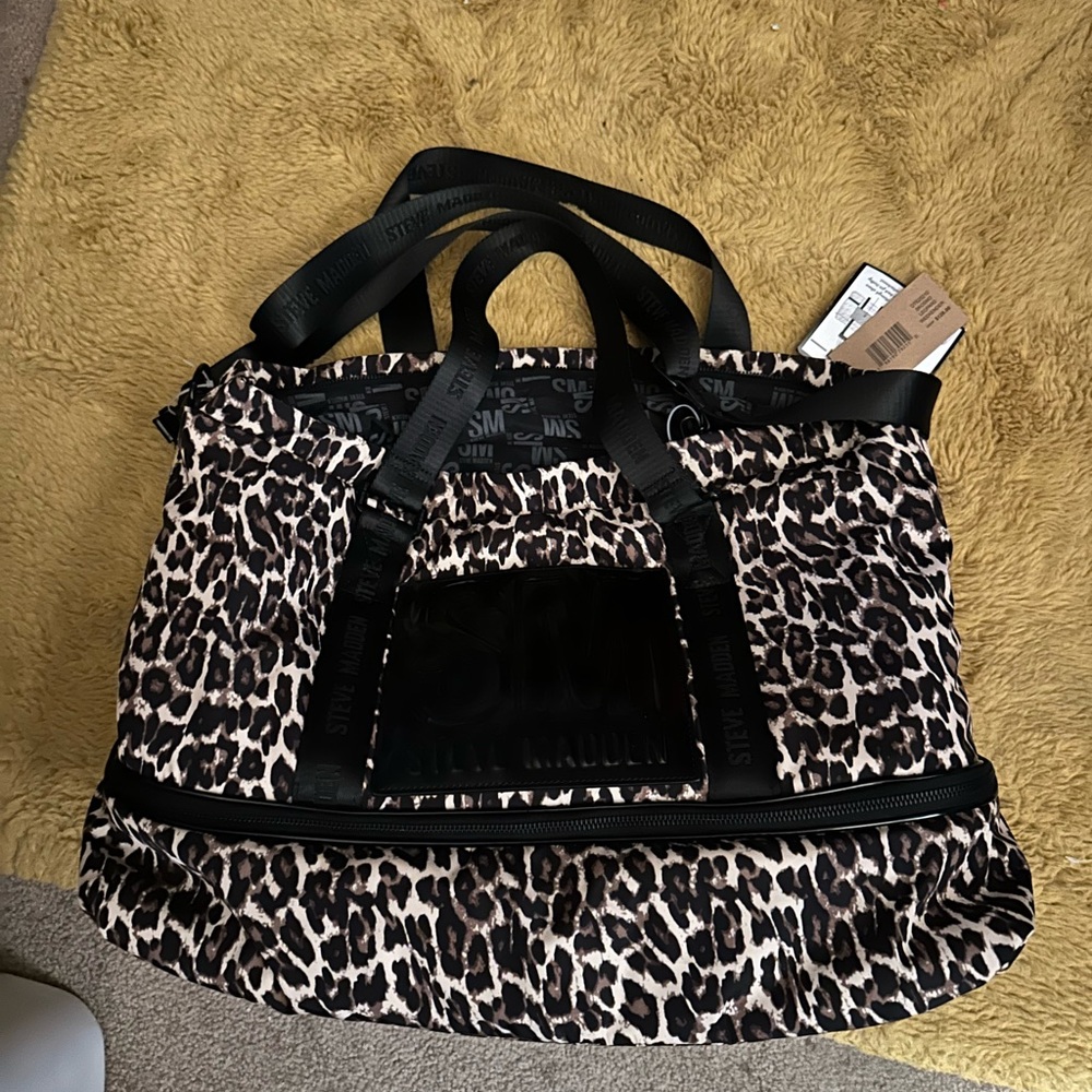 Steve Madden Brown and Black Travel Bag with Structured Design